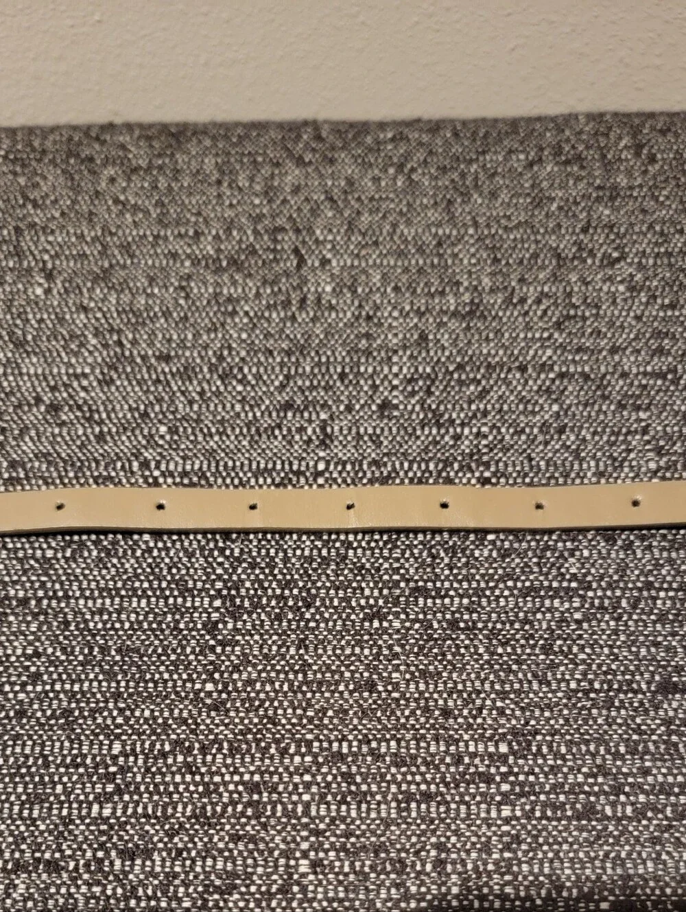 Thin taupe belt